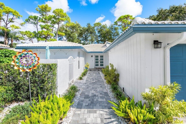 view of property exterior with a garage