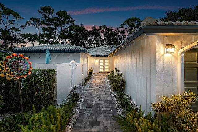 view of property exterior at dusk