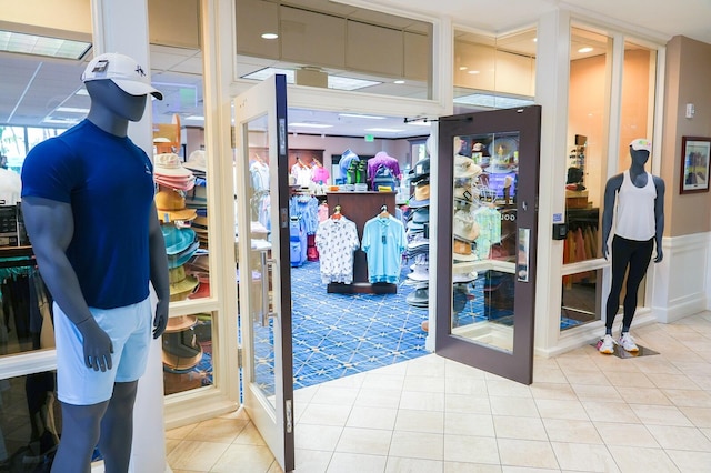 interior space featuring french doors and tile patterned flooring