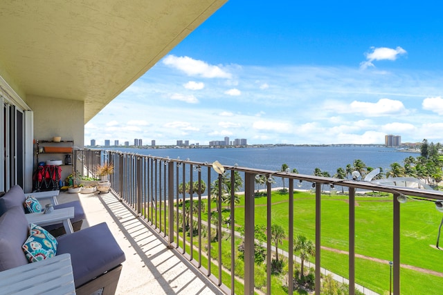 balcony featuring a water view