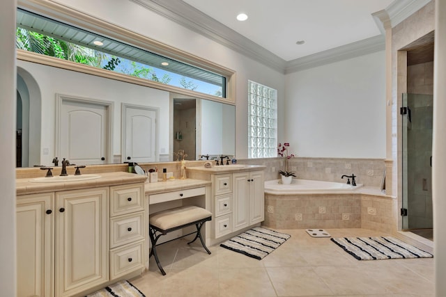 bathroom with a garden tub, ornamental molding, a stall shower, vanity, and tile patterned floors