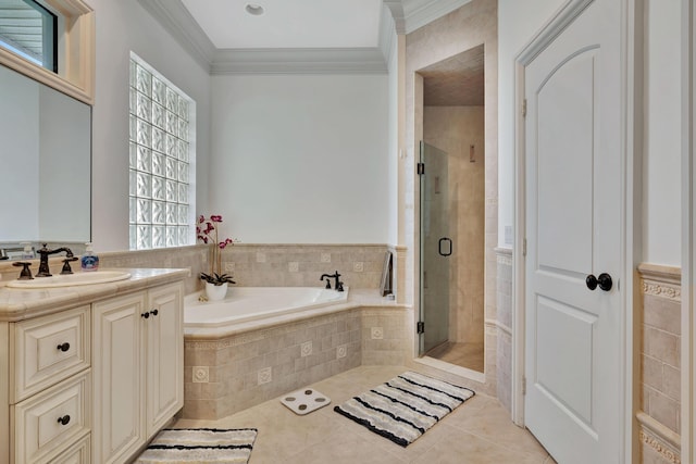 bathroom featuring ornamental molding, tile patterned flooring, plenty of natural light, and a stall shower