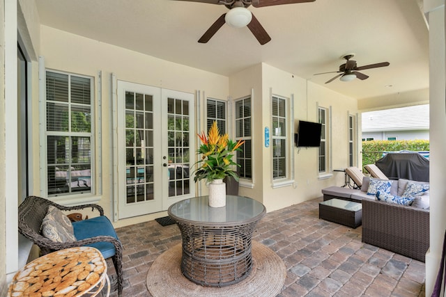 exterior space featuring ceiling fan, an outdoor hangout area, and french doors