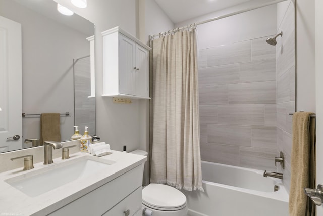 full bathroom with shower / bath combination with curtain, vanity, and toilet