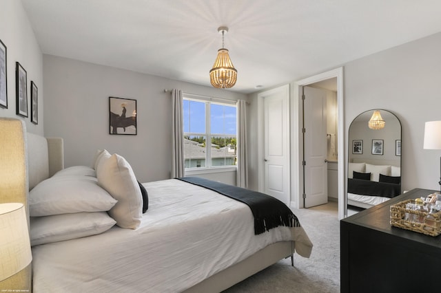 bedroom with light carpet and arched walkways