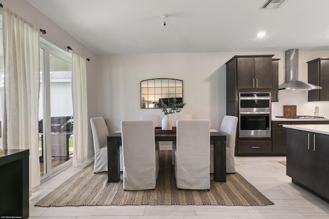 dining room with visible vents