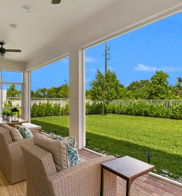 exterior space with a healthy amount of sunlight and ceiling fan