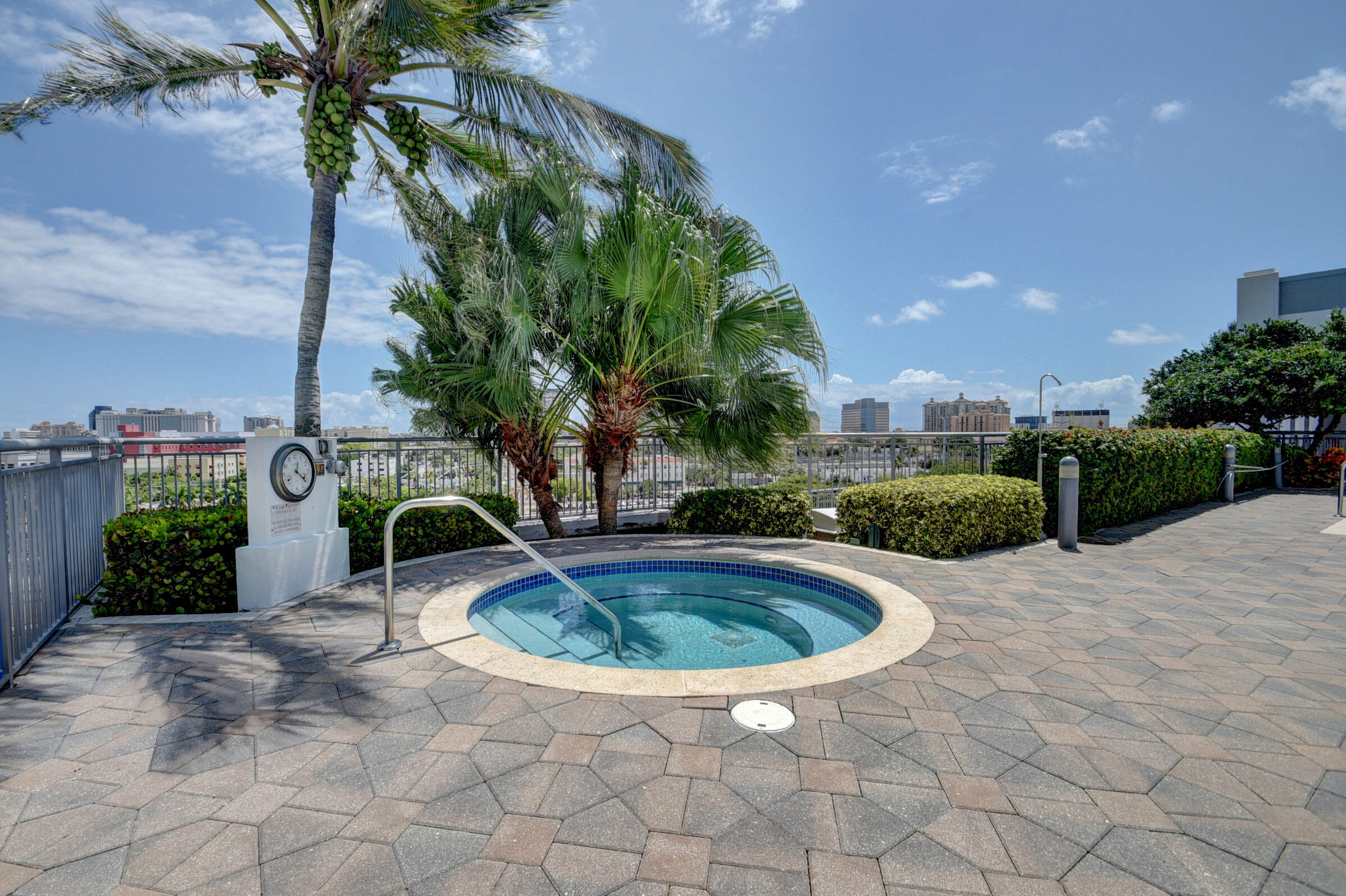 view of pool with a patio and a community hot tub