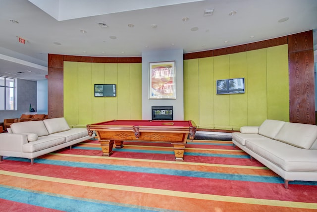 game room with carpet flooring, wooden walls, and pool table