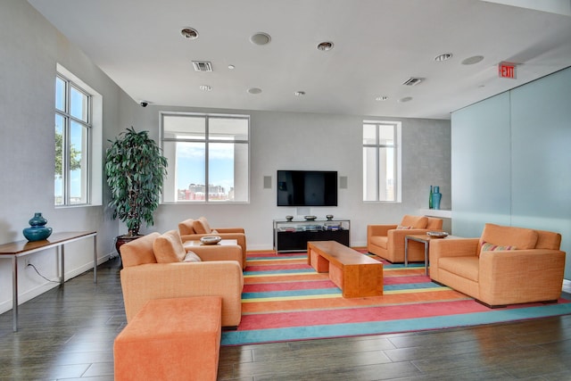 living room with dark wood finished floors, recessed lighting, baseboards, and visible vents