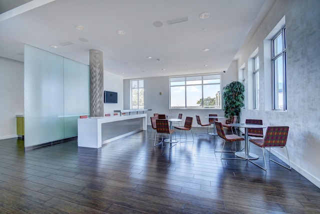 interior space featuring dark wood-style floors and visible vents