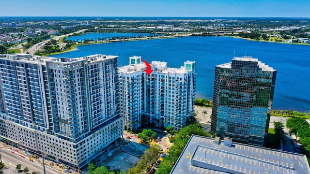 drone / aerial view with a water view and a view of city