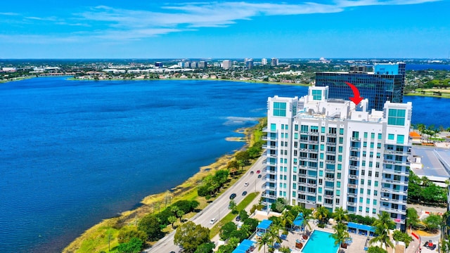 drone / aerial view with a water view and a city view