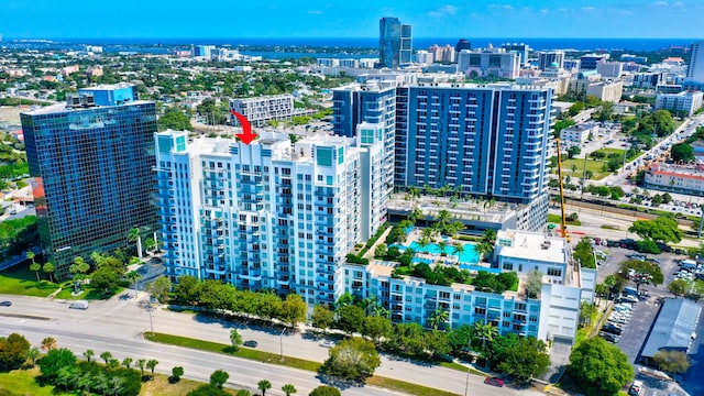 birds eye view of property with a view of city