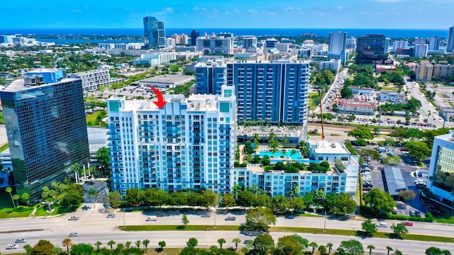 birds eye view of property with a city view