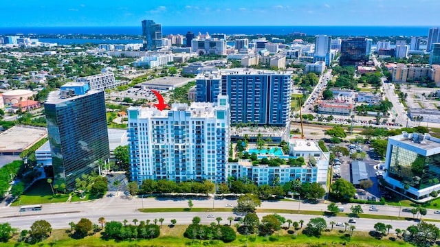 birds eye view of property with a city view