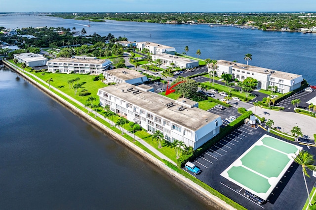 drone / aerial view with a water view