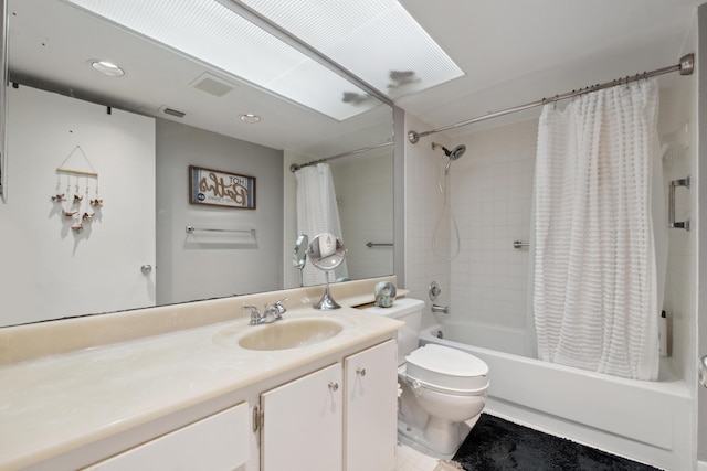 full bathroom with vanity, toilet, and shower / bath combo