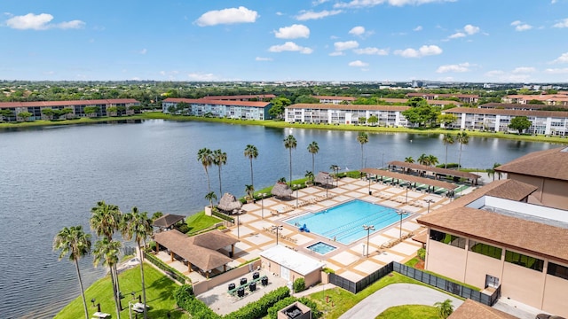 bird's eye view with a water view