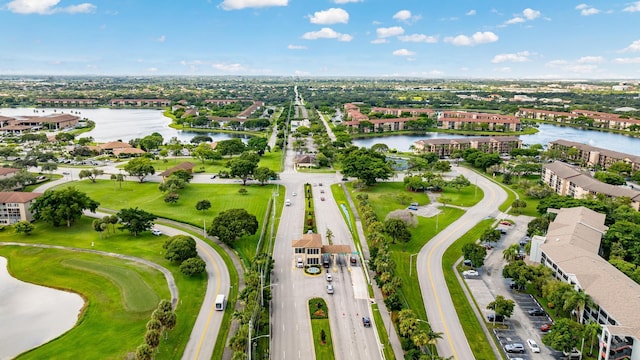 drone / aerial view with a water view