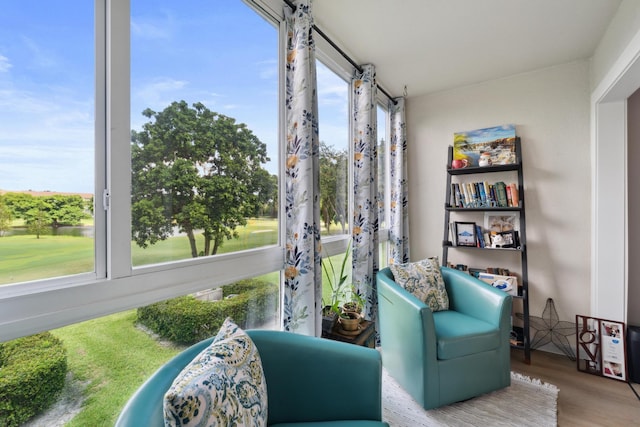 sunroom / solarium featuring a healthy amount of sunlight