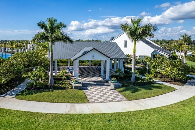 view of community featuring a gazebo and a yard