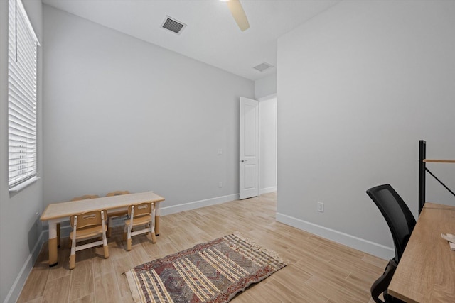 office area featuring light wood-type flooring and ceiling fan