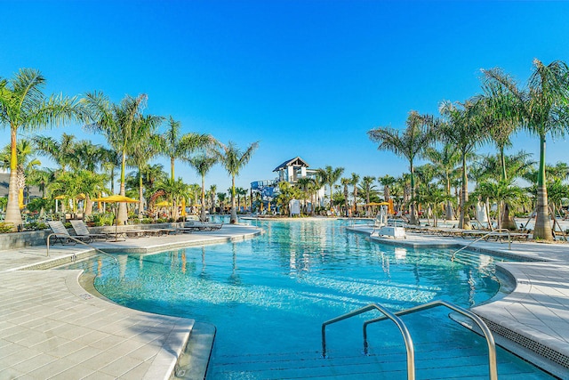 view of swimming pool with a patio