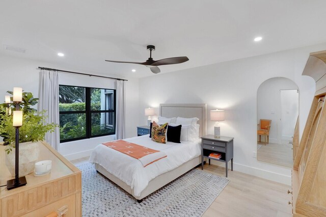 bedroom featuring ceiling fan and light hardwood / wood-style floors