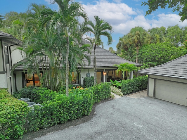 view of property exterior featuring a garage