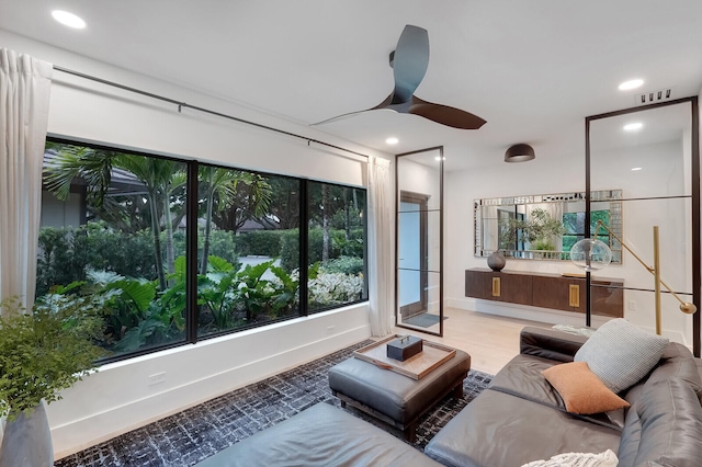 living room with ceiling fan