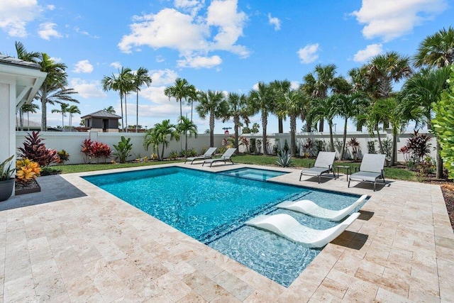 view of pool featuring a patio area