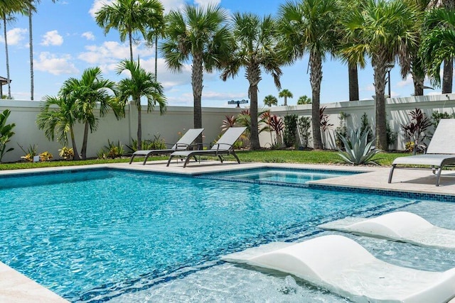 view of swimming pool featuring a patio