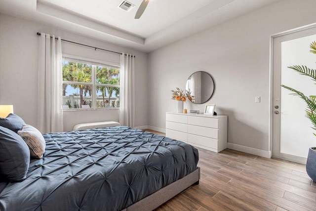 bedroom featuring ceiling fan and wood-type flooring