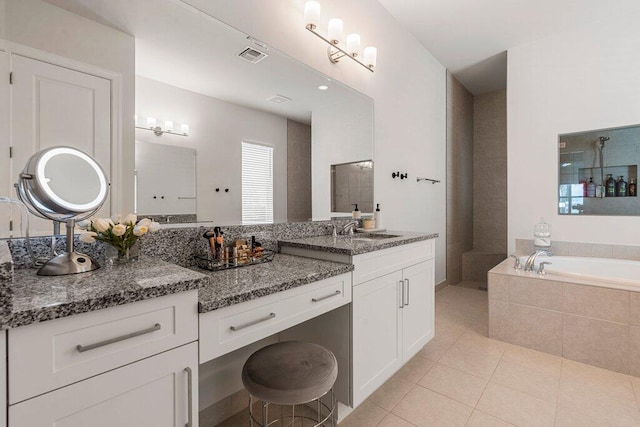 bathroom featuring vanity, separate shower and tub, and tile patterned flooring