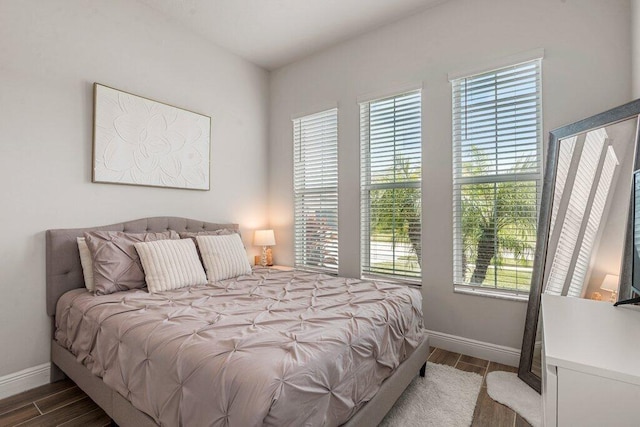 bedroom featuring hardwood / wood-style floors