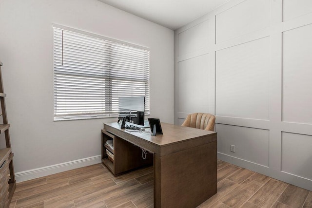 office space featuring hardwood / wood-style floors