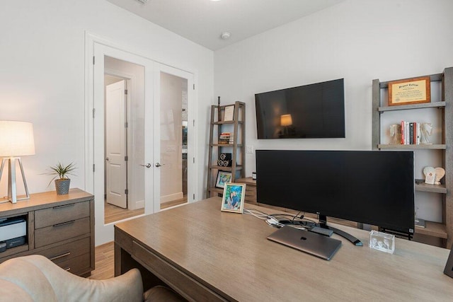 home office with light wood-type flooring