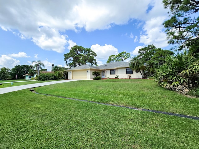 ranch-style house with a front yard and a garage