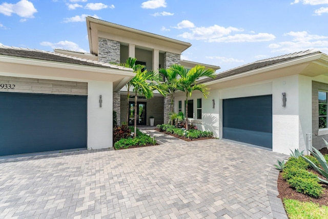 view of front of home with a garage