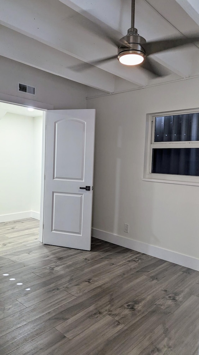 interior space featuring beam ceiling, ceiling fan, and hardwood / wood-style flooring