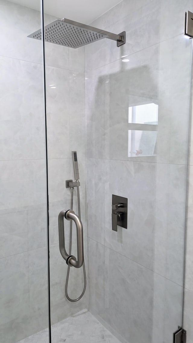 bathroom with an enclosed shower