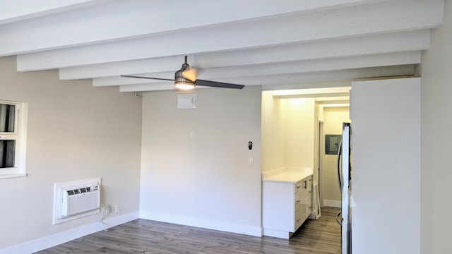 laundry area with hardwood / wood-style flooring, a wall mounted air conditioner, and ceiling fan