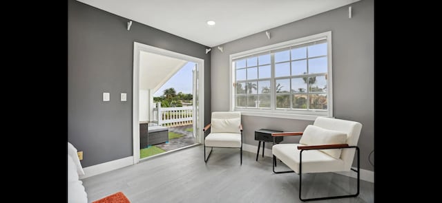 6785 Escondida Dr, Lake Clarke Shores, FL 33406 - sitting room with baseboards, recessed lighting, and wood finished floors