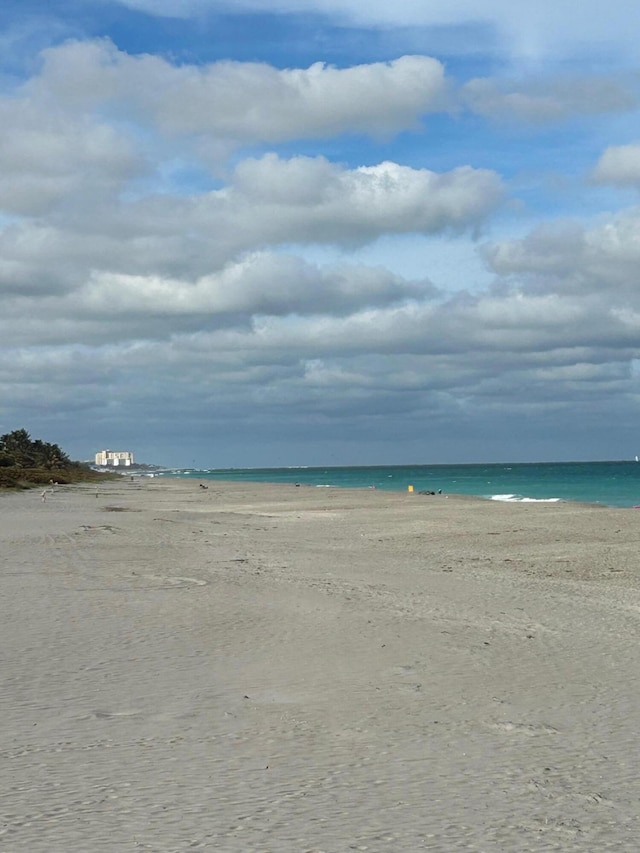 property view of water featuring a view of the beach