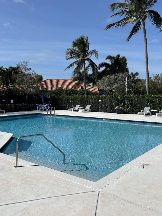 view of swimming pool featuring a patio