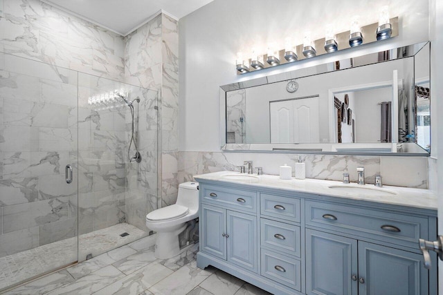 bathroom featuring tile patterned floors, an enclosed shower, vanity, tile walls, and toilet