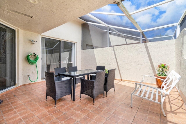 view of patio with a lanai