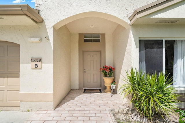 9859 Boca Gardens Cir Unit B, Boca Raton, FL 33496 - entrance to property with stucco siding