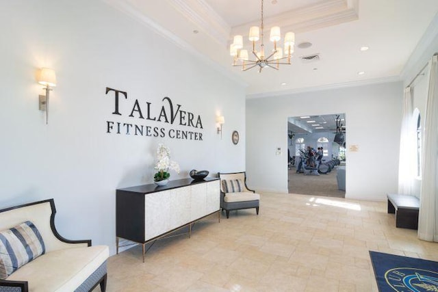 welcome area with an inviting chandelier